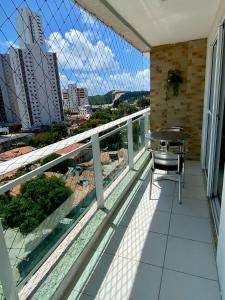 Balkon atau teras di Varandas Premium flat