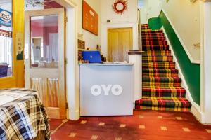 Postel nebo postele na pokoji v ubytování OYO Glenpark Hotel, Ayr Central