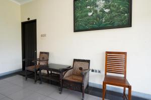 Posezení v ubytování Capital O 1430 Hotel Ratna Syariah