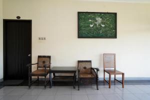 Posezení v ubytování Capital O 1430 Hotel Ratna Syariah