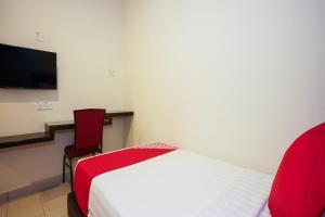 TV a/nebo společenská místnost v ubytování Hotel O Jj Hotel Sitiawan