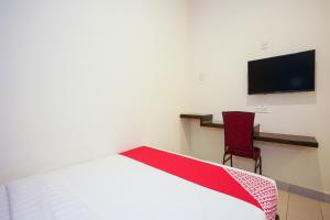 TV a/nebo společenská místnost v ubytování Hotel O Jj Hotel Sitiawan