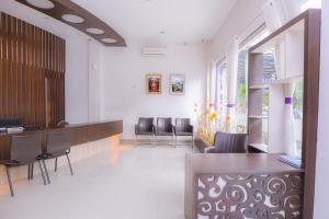 Гостиная зона в Super OYO Capital O 1630 Hotel Syariah Ring Road