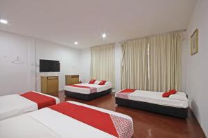 Postel nebo postele na pokoji v ubytování OYO 89562 Hotel Shalimar