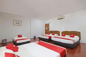 Postel nebo postele na pokoji v ubytování OYO 89562 Hotel Shalimar