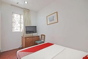 TV a/nebo společenská místnost v ubytování OYO 89562 Hotel Shalimar
