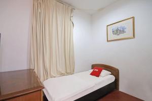 Postel nebo postele na pokoji v ubytování OYO 89562 Hotel Shalimar