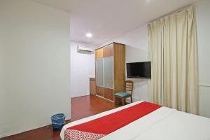 TV a/nebo společenská místnost v ubytování OYO 89562 Hotel Shalimar