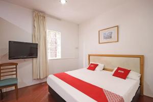 Postel nebo postele na pokoji v ubytování OYO 89562 Hotel Shalimar