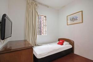 TV a/nebo společenská místnost v ubytování OYO 89562 Hotel Shalimar