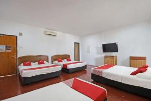 Postel nebo postele na pokoji v ubytování OYO 89562 Hotel Shalimar