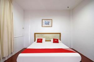 Postel nebo postele na pokoji v ubytování OYO 89562 Hotel Shalimar
