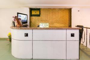 Kuchyň nebo kuchyňský kout v ubytování OYO 373 Habana Hotel