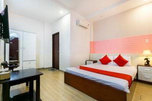 Postel nebo postele na pokoji v ubytování OYO 373 Habana Hotel