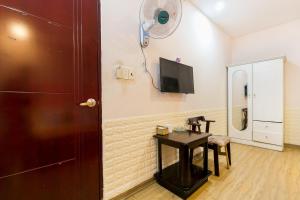 Kuchyň nebo kuchyňský kout v ubytování OYO 373 Habana Hotel