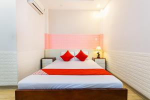 Postel nebo postele na pokoji v ubytování OYO 373 Habana Hotel