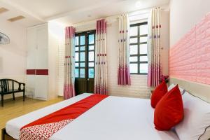 Postel nebo postele na pokoji v ubytování OYO 373 Habana Hotel
