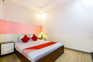 Postel nebo postele na pokoji v ubytování OYO 373 Habana Hotel