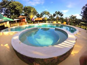 Bazén v ubytování Al Hamra Jungle Resort nebo v jeho okolí + 37 fotografií
