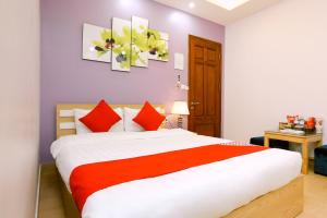 Postel nebo postele na pokoji v ubytování Tuan Anh Hotel