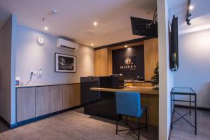TV a/nebo společenská místnost v ubytování OYO 89576 Mokka Hotel