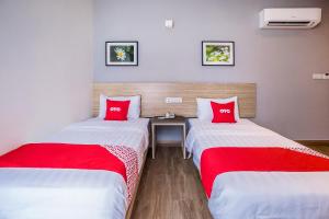 Postel nebo postele na pokoji v ubytování OYO 89576 Mokka Hotel