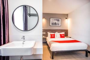 Postel nebo postele na pokoji v ubytování OYO 89576 Mokka Hotel