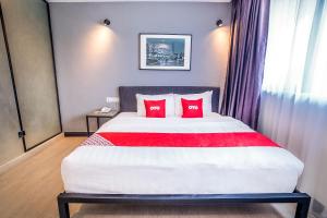 Postel nebo postele na pokoji v ubytování OYO 89576 Mokka Hotel