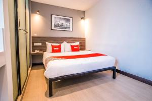 Postel nebo postele na pokoji v ubytování OYO 89576 Mokka Hotel