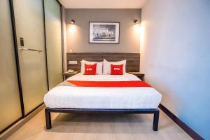 Postel nebo postele na pokoji v ubytování OYO 89576 Mokka Hotel
