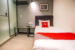 Postel nebo postele na pokoji v ubytování OYO 89576 Mokka Hotel