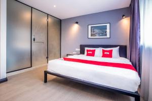 Postel nebo postele na pokoji v ubytování OYO 89576 Mokka Hotel