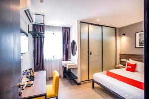 Postel nebo postele na pokoji v ubytování OYO 89576 Mokka Hotel