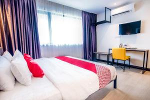 TV a/nebo společenská místnost v ubytování OYO 89576 Mokka Hotel