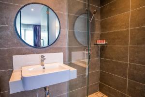 Koupelna v ubytování OYO 89576 Mokka Hotel