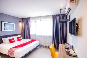 Postel nebo postele na pokoji v ubytování OYO 89576 Mokka Hotel