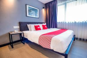 Postel nebo postele na pokoji v ubytování OYO 89576 Mokka Hotel