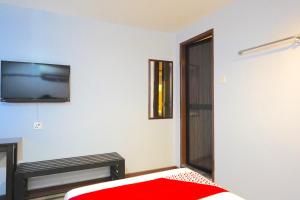 Postel nebo postele na pokoji v ubytování Super OYO 89544 Utama Inn