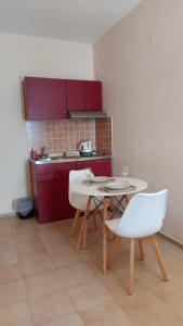 Kuchyň nebo kuchyňský kout v ubytování Sea Breeze Apartments