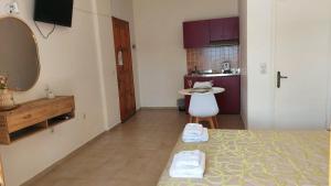 Postel nebo postele na pokoji v ubytování Sea Breeze Apartments