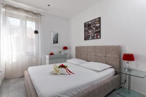 Ein Bett oder Betten in einem Zimmer der Unterkunft Apartments Kala & Kaleta