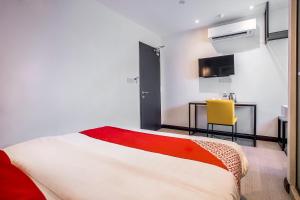 Postel nebo postele na pokoji v ubytování OYO 89576 Mokka Hotel
