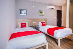 Postel nebo postele na pokoji v ubytování OYO 89576 Mokka Hotel