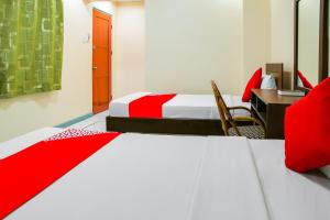 Postel nebo postele na pokoji v ubytování Le Pensione De San Jose