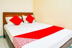 Postel nebo postele na pokoji v ubytování Le Pensione De San Jose