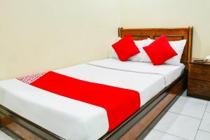 Postel nebo postele na pokoji v ubytování Le Pensione De San Jose