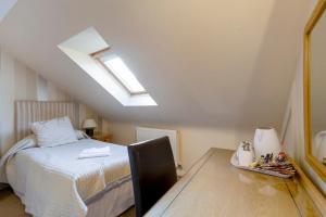 Ένα ή περισσότερα κρεβάτια σε δωμάτιο στο Arden Guest House, Craigmillar Castle Edinburgh