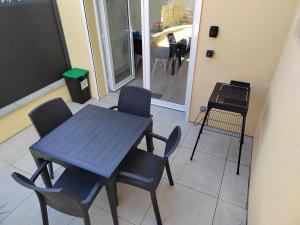 Posezení v ubytování Gîte indépendant de plein pied près de Colmar