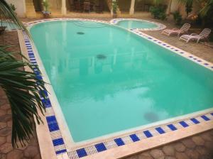 Bazén v ubytování Jannataan Hotel nebo v jeho okolí