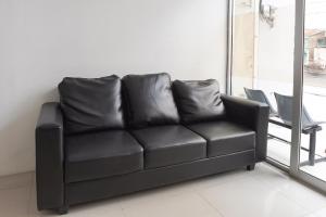 Posezení v ubytování Super OYO 2183 Cibeureum Residence
